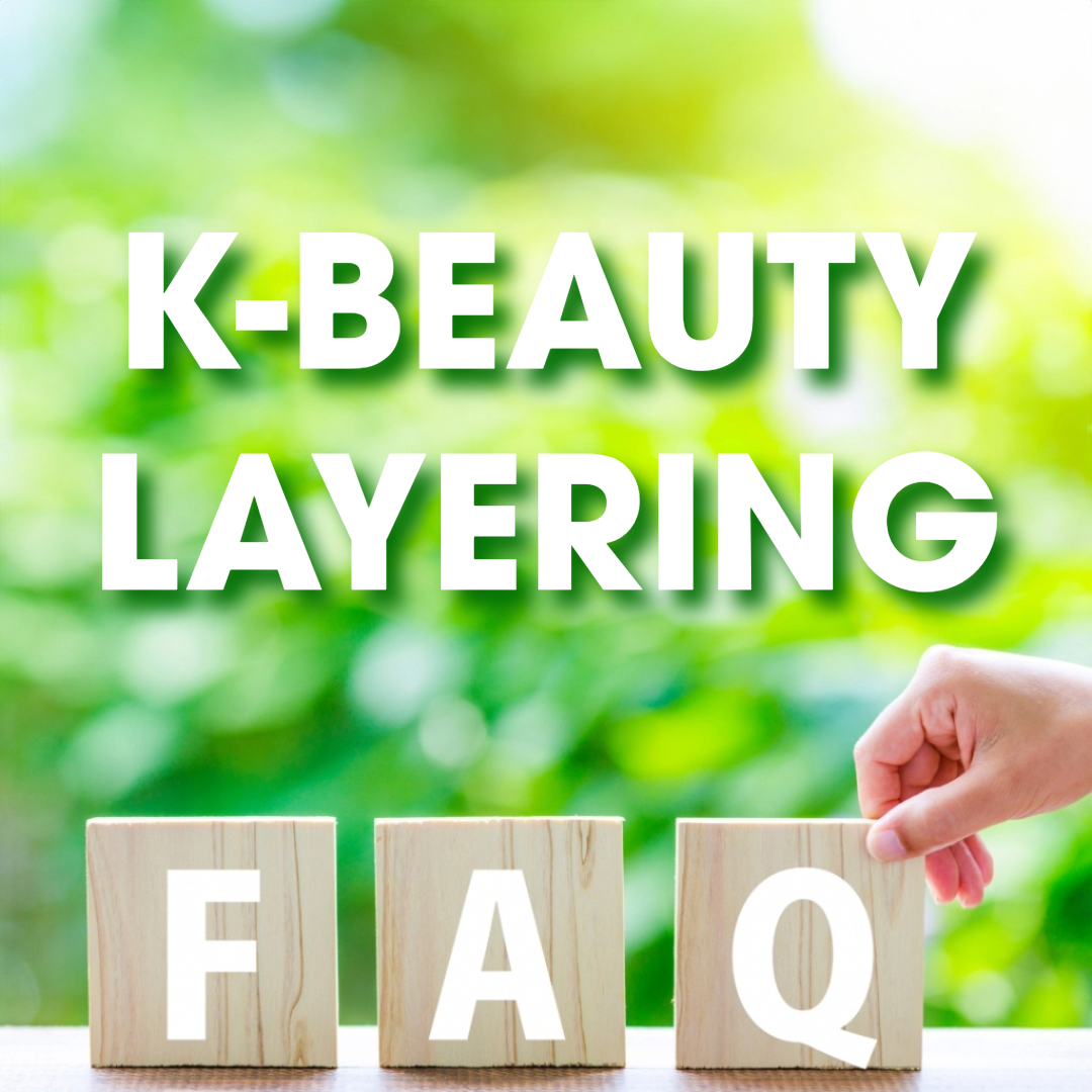 K-Beauty Layering words with F A Q blocks. Hand is on the Q block. Background is blurred out greenery.